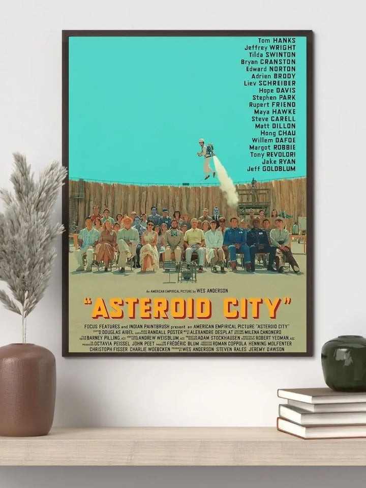 Asteroid City 2023 movie poster featuring the stylised 1955 desert town, observatory, and Junior Stargazers with Wes Anderson’s trademark symmetrical composition and pastel colour palette.