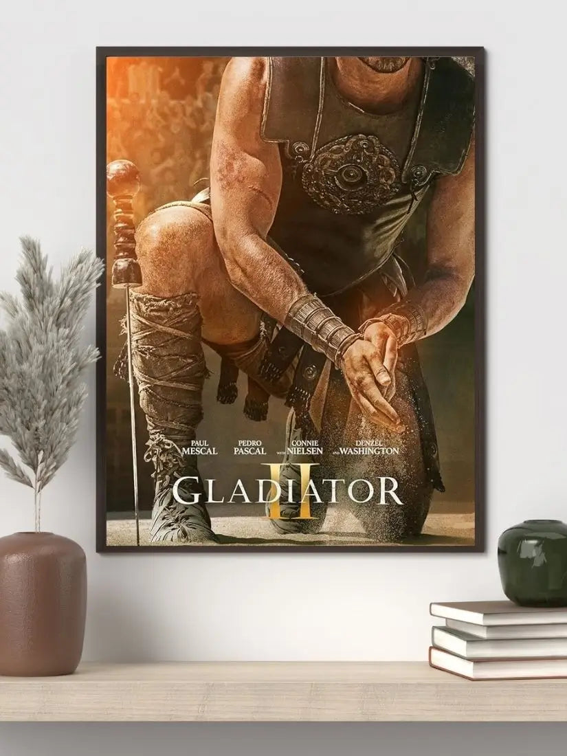 Gladiator II 2024 movie poster showing Lucius standing in the Colosseum amid roaring crowds, Roman soldiers, and dust-filled arena light, echoing the epic scale of ancient Rome.