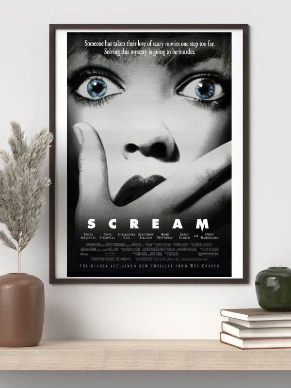 Scream 1996 movie poster featuring Ghostface and the Woodsboro teen cast from Wes Craven’s classic slasher horror film​