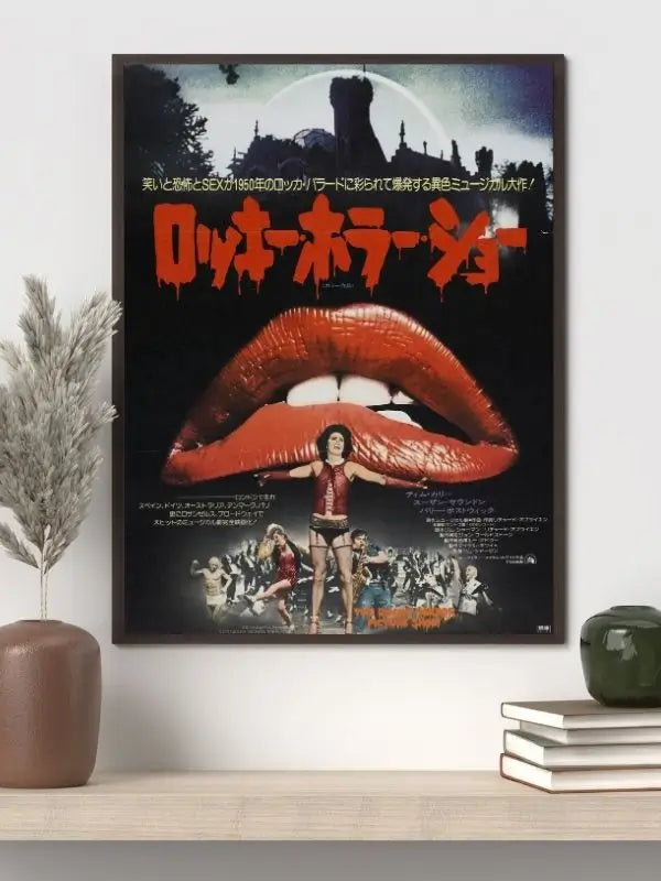 The Rocky Horror Picture Show 1975 movie poster featuring Tim Curry as Frank‑N‑Furter in corset and fishnets with red lips motif and the cast framed around the iconic logo.​
